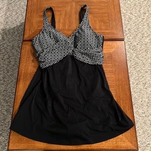 Swim dress with built in bra and place for breast enhancement after mastectomy
